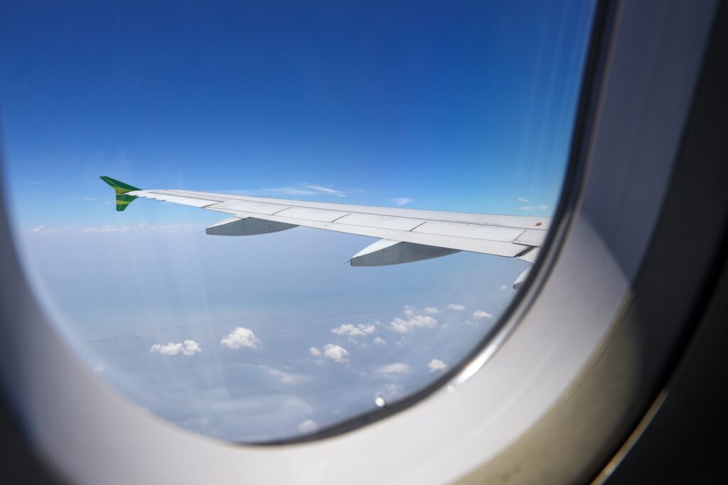 Airplane wing through the window